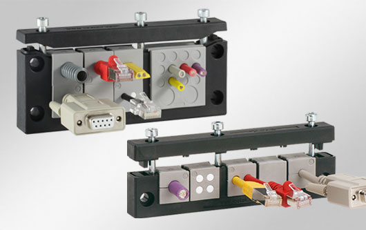 KEL-U split cable entry frames for cables with connectors / IP54 / UL Type 12 Grommet based cable entry frames suitable for cut-outs of heavy industrial connectors. Available as single or double row version.